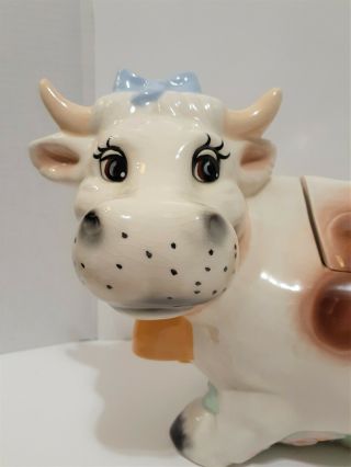 Vintage Large Brown and White Holstein Cow Cookie Jar Blue Bow Grass Pink Flower 2