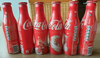 Coca Cola Alu Bottle From Benelux.  Christmas.  6 Empty Bottles