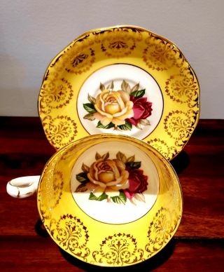 Stunning Queen Anne Floating Rose Cup And Saucer Yellow Gold Gilt