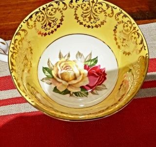 STUNNING QUEEN ANNE FLOATING ROSE CUP And Saucer Yellow Gold Gilt 2