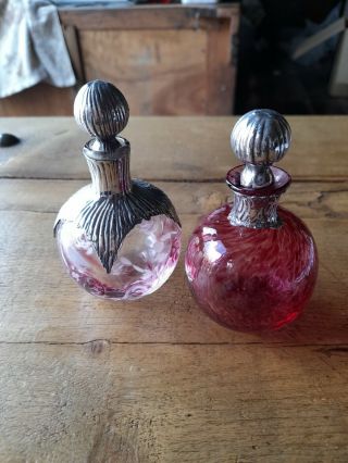 Purfume Bottles With White Metal Tops