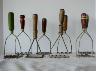 Eight Vintage Hand Held Metal Kitchen Potato Mashers With Wooden Handles