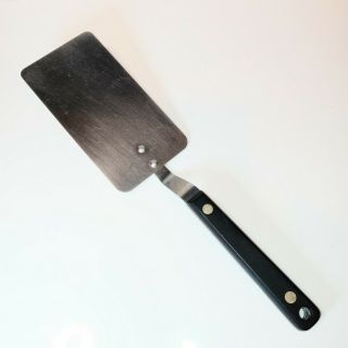 Vintage Ekco Forge Spatula.  Solid Stainless 12 " W Black Handles Grommets