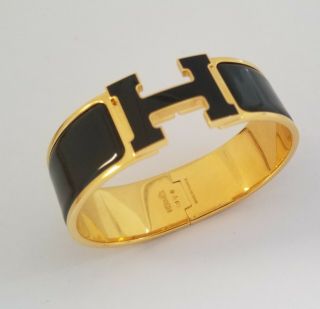 Hermes Clic Clac H Bracelet Gold & Black Enamel Celebrity Owned