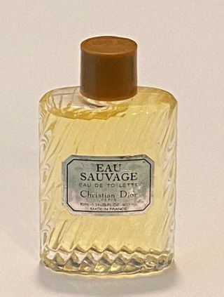 Vintage Eau Savage By Christian Dior Eau De Toilette.  34fl Oz/10ml Splash Bottle
