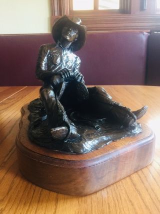 Solid Bronze Western Sculpture: Cowboy Resting On Saddle: Handmade: Dave Kulczyk