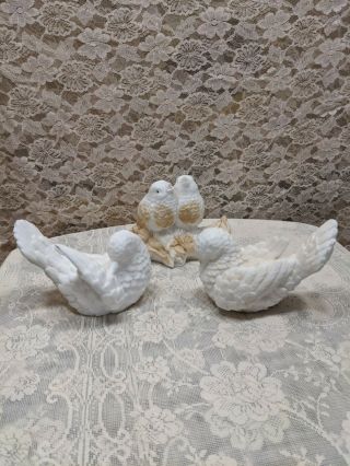 A Santini Sculptures Of Doves & Birds
