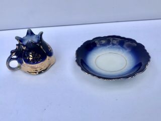 Tea cup and saucer cobalt blue and gold collectible mini drink ware Dining Room 3