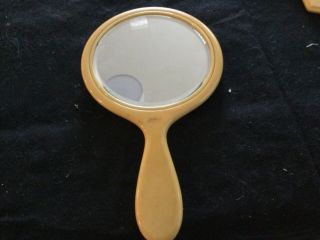 Vintage Celluloid Ivory Pyralin Hand Held Beveled Vanity Mirror