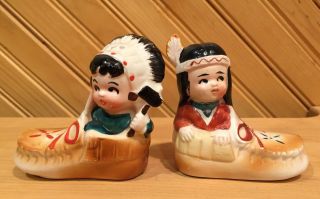 Vintage Indian Boy And Girl Sitting In Moccasins Salt & Pepper Shakers