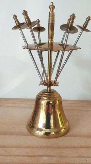 Set Of 6 Vintage Toledo Cocktail Swords Mounted On A Brass Bell.