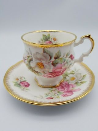 Elizabethan Fine Bone China Floral Pattern Tea Cup And Saucer With Gold Trim