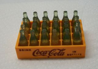 Case Of 24 Miniature Coca Cola Bottles.