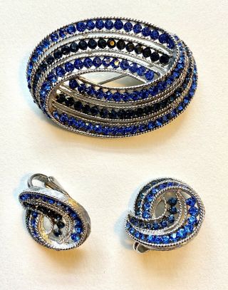Crown Trifari Brooch And Earrings Set With Silver Metal And Blue Rhinestones