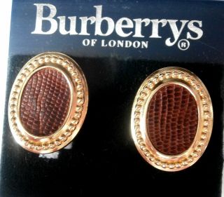 Burberrys Of London Gold Plated Clip Earrings With Burberry Logo