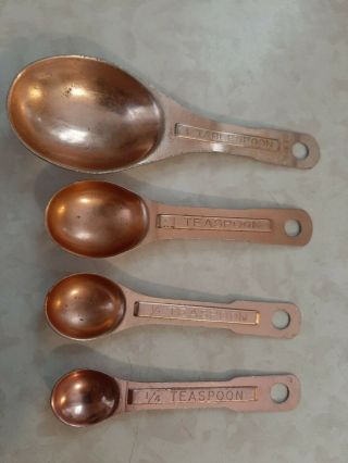 Vintage Rose Copper Color Aluminum Measuring Spoon Set U.  S.  Standard