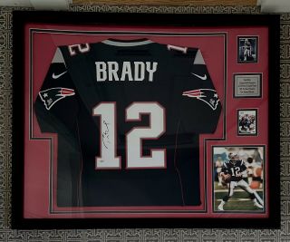 Tom Brady Authentic Framed Hand Signed Framed Patriots Jersey - 31 X 39 Inches.