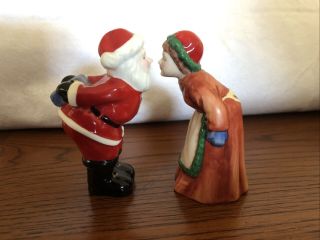 Santa And Mrs.  Claus Kissing Ceramic Salt & Pepper Shakers