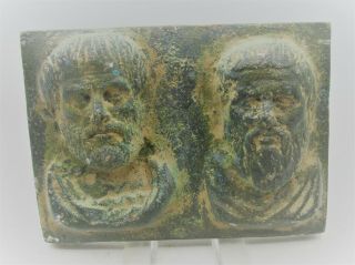 European Finds Ancient Roman Bronze Plaque Depicting 2 Biblical Male Faces
