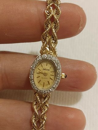 Ladies Vintage 14 Kt Yellow Gold Jaguar Watch W/ Diamond Bezel & Sapphire Stem