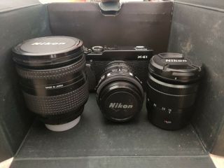 Fujifilm X - E1 With 2 Vintage Nikkor Lenses And 1 Kit Lens