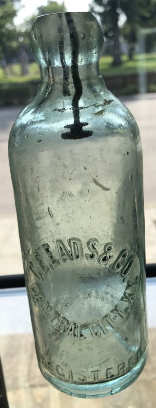 Vintage Embossed C.  E.  Eads & Co.  7” Green Hutch Bottle Central City,  Kentucky