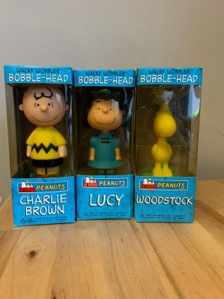 Funko Wacky Wobbler Peanuts Charlie Brown - Lucy - Woodstock Bobble Heads Mib