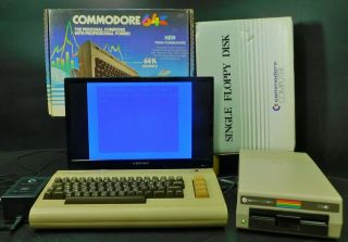 Vintage Commodore 64 With 1541 Single Floppy Disk Drive With Boxes