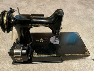 1953 Vintage Singer Featherweight with case and accessories 5