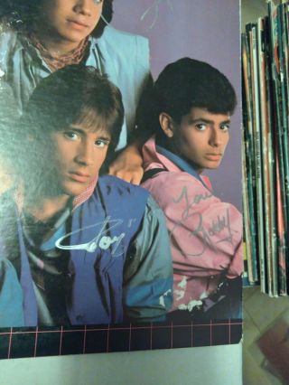 Menudo - Evolucion LP 1984 - Autographed by Ricky Martin and band 3