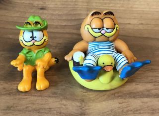 Vintage Garfield 2 Figures Garfield On Rubber Duck Inner Tube/ Safari Garfield