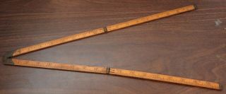 Vintage 36 " Fold - Up Wood Ruler W/brass Fittings.  One Section Is Warped