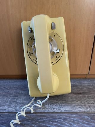 Vintage Bell System Western Electric Wall Mount Rotary Dial Telephone Yellow