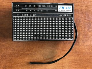 Vintage Universum Nine (9) Transistor Two (2) Band Radio.  Fm,  Am Portable