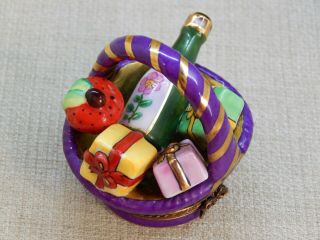 Limoges France Porcelain Hinged Trinket Box,  Basket Of Gifts And A Wine Bottle