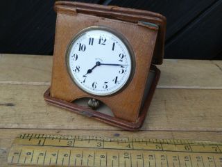 Antique 8 Day Folding Travel Clock.  Leather Cased Travel Clock With Enamel Dial
