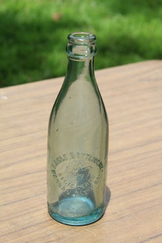 Kansas City Missouri Eagle Bottling Picture Embossed Bottle MO Circle Slug 2