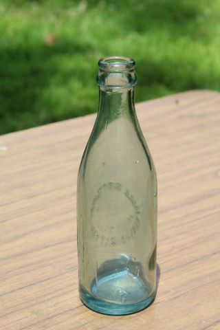 Kansas City Missouri Eagle Bottling Picture Embossed Bottle MO Circle Slug 3