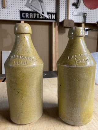 2 F.  Mc Kinneys Mead Stoneware Beer Bottle