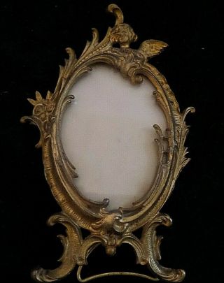 Antique Small Art Nouveau Ormolu Picture Frame On Wire Easel Cupid Top W/glass