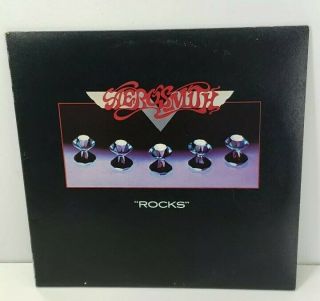Aerosmith Rocks 1976 Sterling Press Lp " Back In The Saddle " Pre - Owned.  (ex)