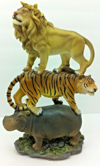 Tiger And Lion Standing On The Back Of A Hippopotamus Resin Figurine