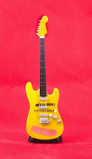 Miniature Guitar Sex Pistols Guitar On Stand.  Includes Case