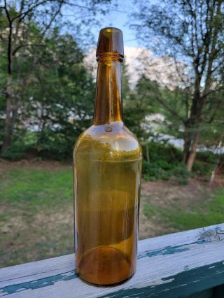Antique Yellow Olive Whiskey Bottle