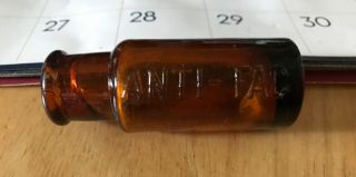 Antique Medicine Bottle With Anti - Fag Embossed On The Side.