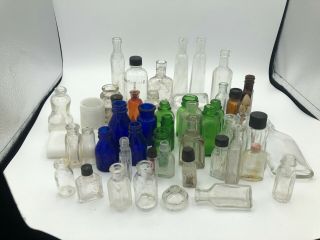 55 Small Old Bottles,  Embossed,  Amber,  Cobalt Clear Glass,  Cork & Screw Top