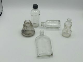 55 small Old bottles,  embossed,  amber,  Cobalt clear glass,  cork & screw top 3